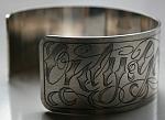 Tattoostyle engraves cuff bracelet.